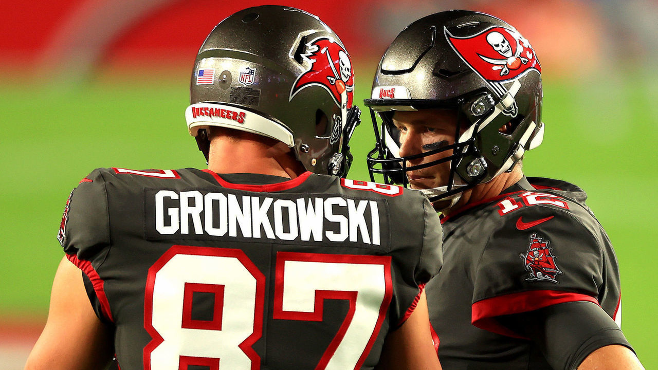 TAMPA, FLORIDA - NOVEMBER 23: Rob Gronkowski #87 and Tom Brady #12 of the Tampa Bay Buccaneers talk prior to the game against the Los Angeles Rams at Raymond James Stadium on November 23, 2020 in Tampa, Florida.