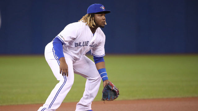 TORONTO, ON - APRIL 26: Vladimir Guerrero Jr. #27 of the Toronto Blue Jays gets ready to field his position at third base during MLB game action against the Oakland Athletics at Rogers Centre on April 26, 2019 in Toronto, Canada.