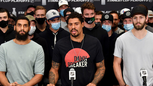 EDMONTON, ALBERTA - AUGUST 27: (L-R) Pierre-Edouard Bellemare #41 of the Colorado Avalanche, Ryan Reaves #75 of the Vegas Golden Knights and Jason Dickinson #18 of the Dallas Stars speak to the media with teammates standing behind after the NHL and NHLPA's announcement to reschedule the games of the Western Conference Second Round of the 2020 NHL Stanley Cup Playoffs at Rogers Place on August 27, 2020 in Edmonton, Alberta. Several sporting leagues across North America are postponing their schedules as players protest the shooting of Jacob Blake by Kenosha, Wisconsin police.