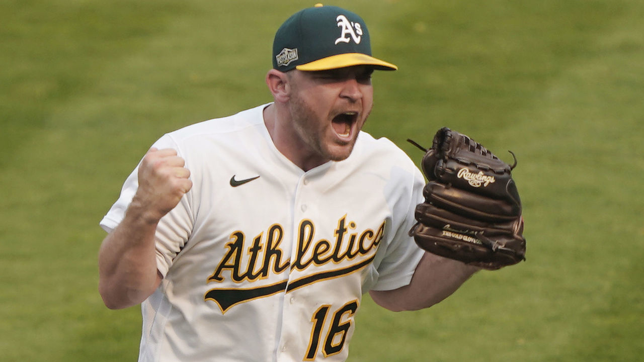 OAKLAND, CALIFORNIA - OCTOBER 01: Liam Hendriks #16 of the Oakland Athletics reacts after he strikes out Nomar Mazara #30 of the Chicago White Sox to end the game and win Game Three of the American League Wild Card Round at RingCentral Coliseum on October 01, 2020 in Oakland, California. The Athletics won the game 6-4.