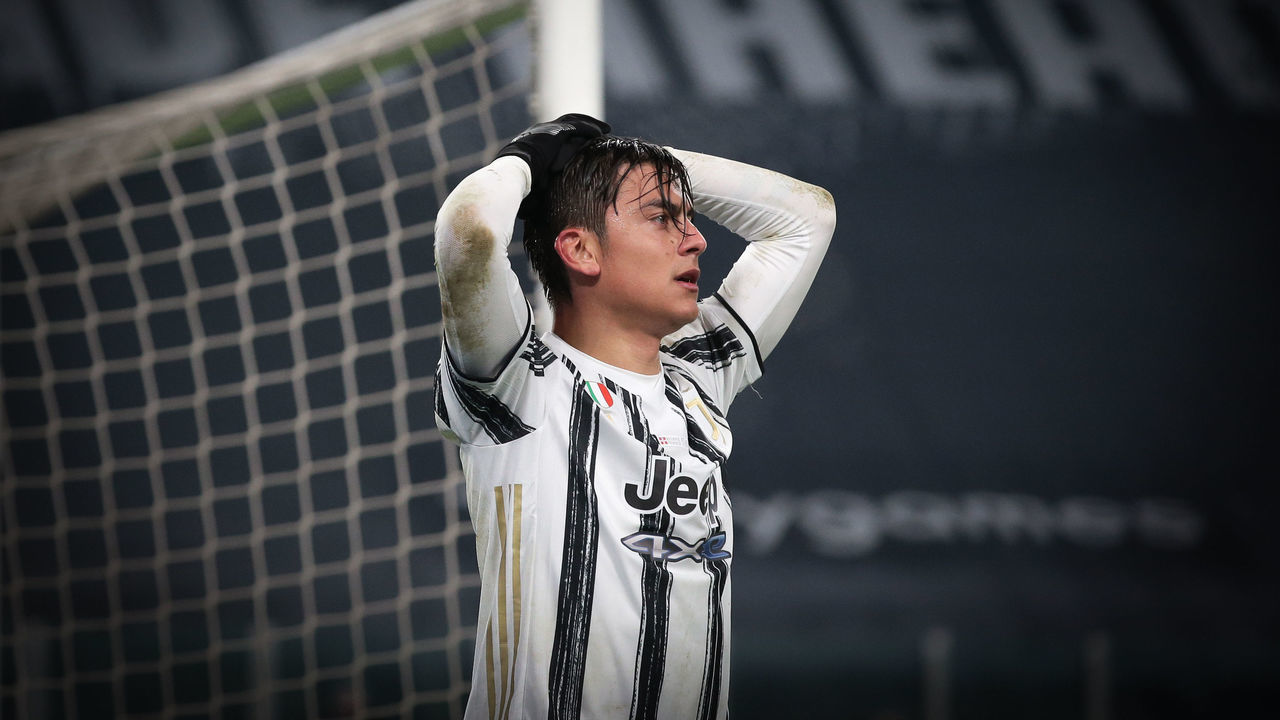 TURIN, ITALY - DECEMBER 05: Paulo Dybala of Juventus reacts after a point blank effort was saved by Salvatore Sirigu in the Torino FC goal during the Serie A match between Juventus and Torino FC at Allianz Stadium on December 05, 2020 in Turin, Italy.