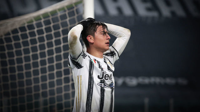 TURIN, ITALY - DECEMBER 05: Paulo Dybala of Juventus reacts after a point blank effort was saved by Salvatore Sirigu in the Torino FC goal during the Serie A match between Juventus and Torino FC at Allianz Stadium on December 05, 2020 in Turin, Italy.