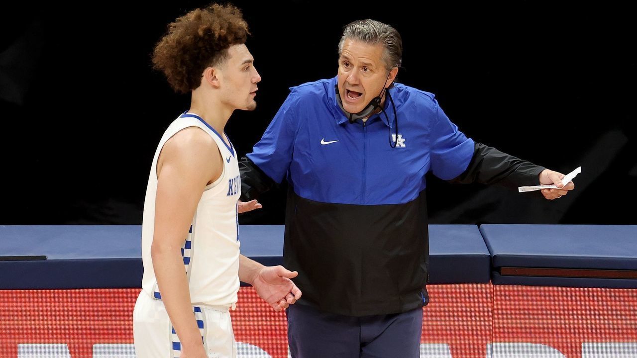 INDIANAPOLIS, INDIANA - DECEMBER 01: John Calipari the head coach of the Kentucky Wildcats gives instructions to Devin Askew #2 against the Kansas Jayhawks in the State Farm Champions Classic at Bankers Life Fieldhouse on December 01, 2020 in Indianapolis, Indiana.
