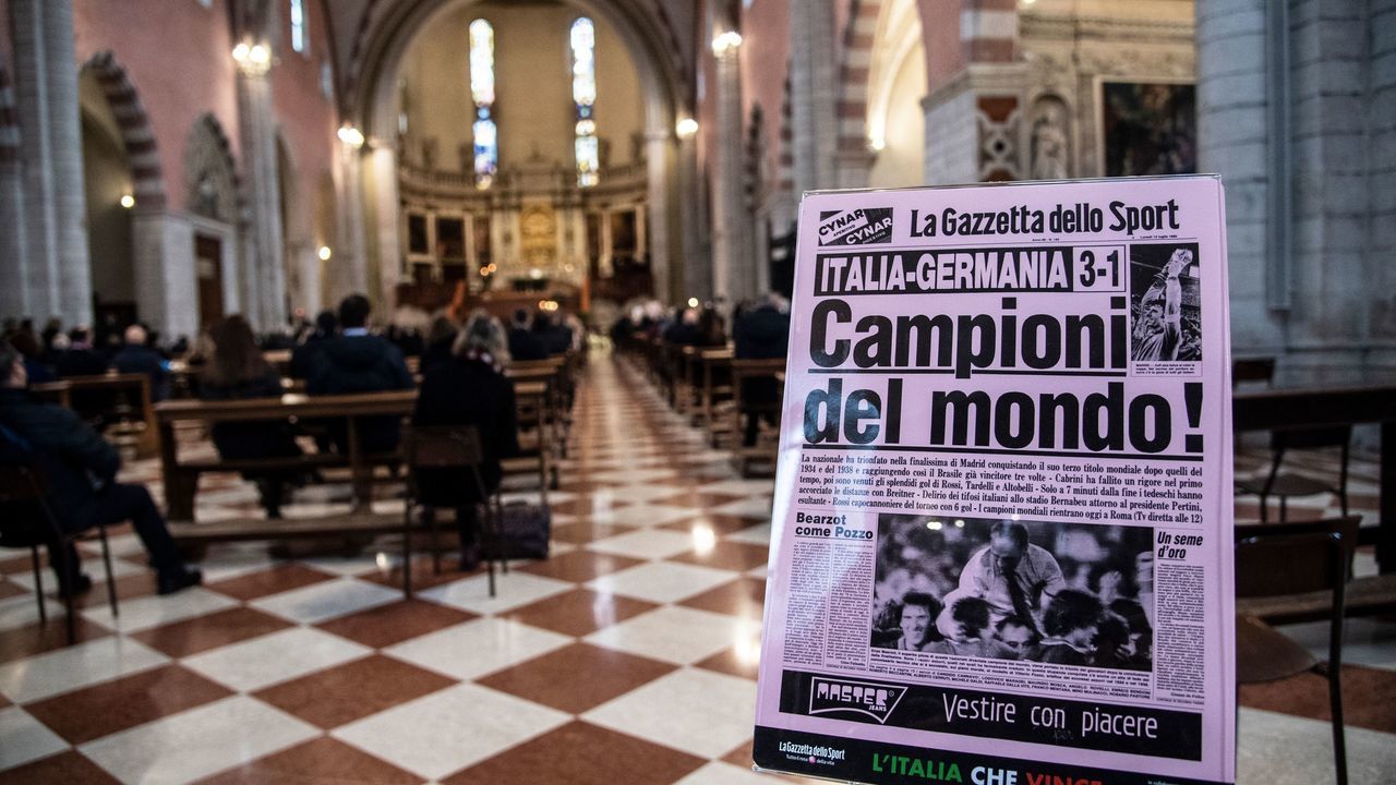 This picture taken on December 12, 2020 shows the front page of 'La Gazzetta dello Sport' dedicated to the victory of Italy in 1982 football World Cup during the funeral of former Italy's football player Paolo Rossi in the Santa Maria Annunciata Cathedral in Vicenza, Northeastern Italy. - Former Italy's football player Paolo Rossi died on December 9, 2020 in Siena at the age of 64.