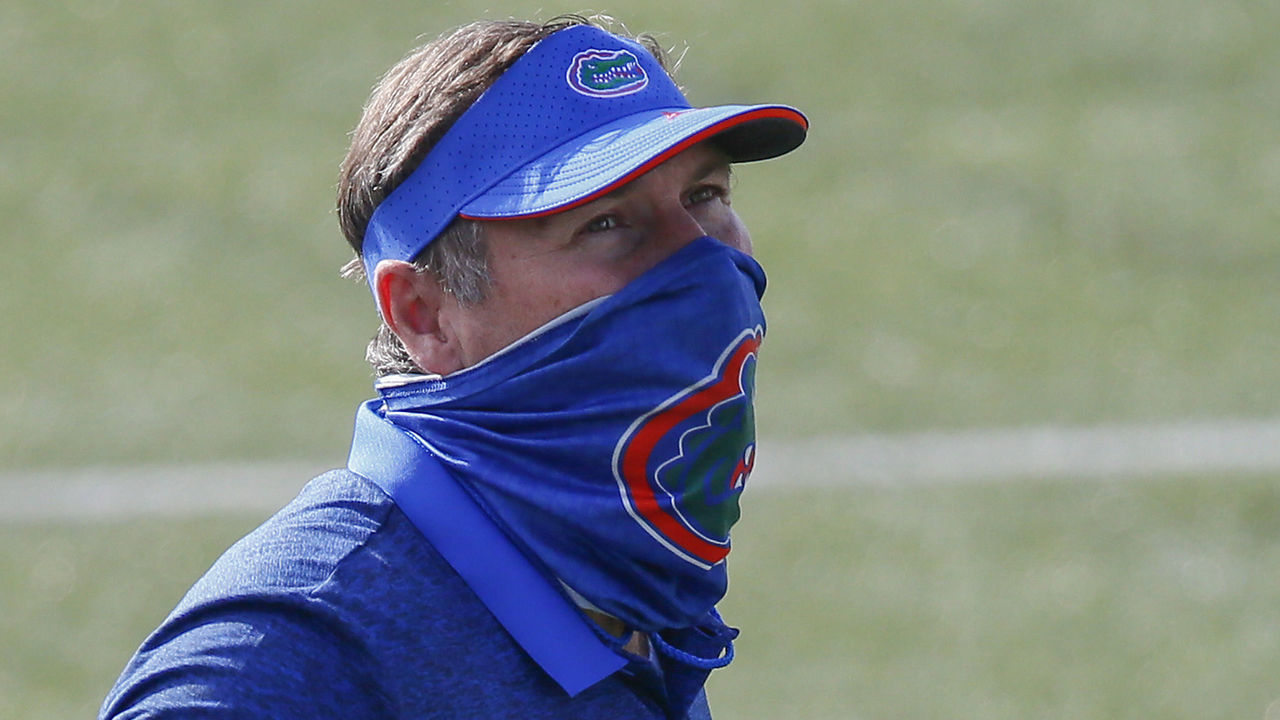 NASHVILLE, TENNESSEE - NOVEMBER 21: Head coach Dan Mullen of the Florida Gators watches his team warm up prior to a game against the Vanderbilt Commodores at Vanderbilt Stadium on November 21, 2020 in Nashville, Tennessee.
