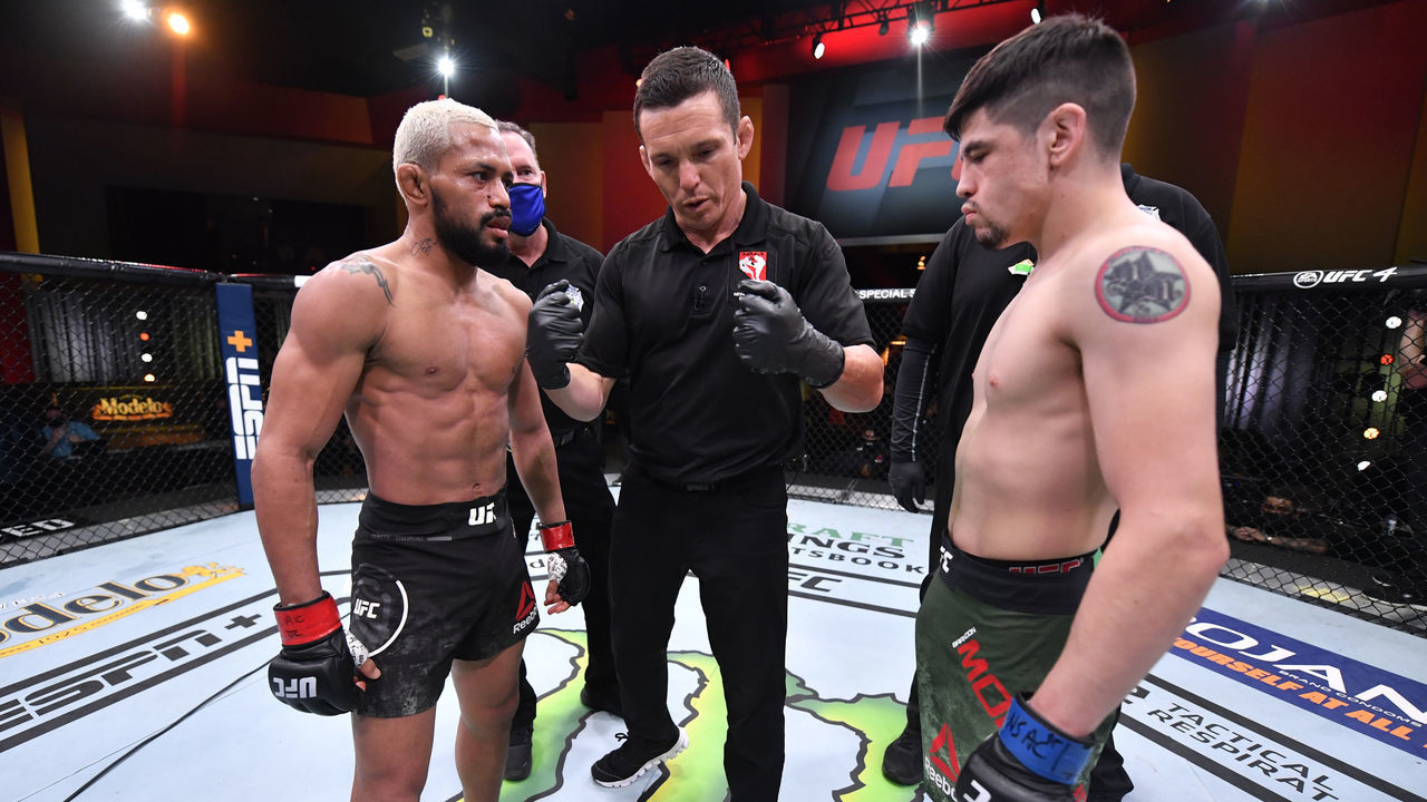 LAS VEGAS, NEVADA - DECEMBER 12: (L-R) Deiveson Figueiredo of Brazil and Brandon Moreno of Mexico face off prior to their flyweight championship bout during the UFC 256 event at UFC APEX on December 12, 2020 in Las Vegas, Nevada.