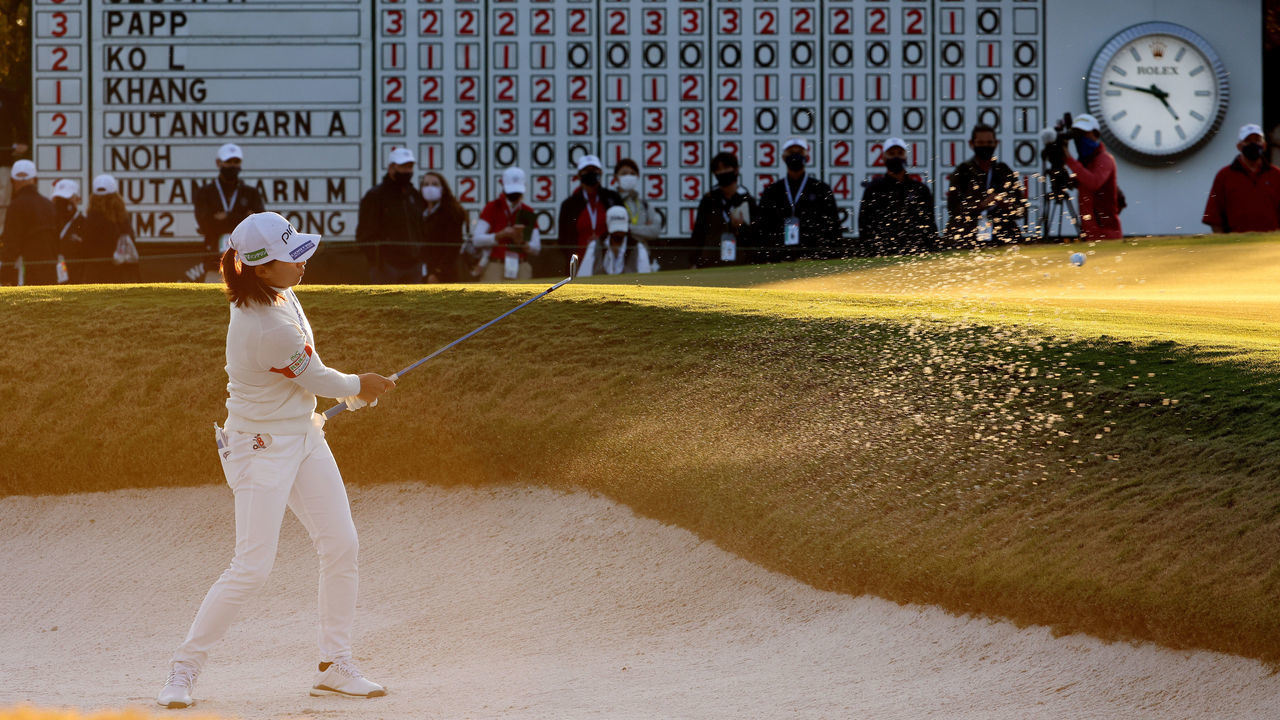 HOUSTON, TEXAS - DECEMBER 12: Hinako Shibuno of Japan plays a shot from a bunker on the 18th hole during the third round of the 75th U.S. Women's Open Championship at Champions Golf Club Cypress Creek Course on December 12, 2020 in Houston, Texas.