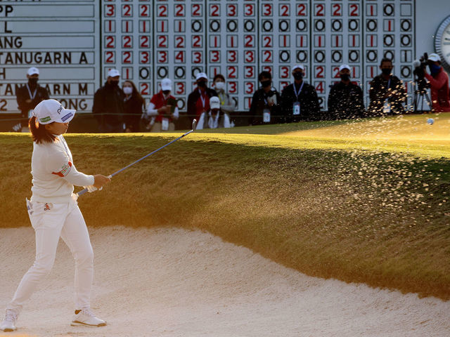 HOUSTON, TEXAS - DECEMBER 12: Hinako Shibuno of Japan plays a shot from a bunker on the 18th hole during the third round of the 75th U.S. Women's Open Championship at Champions Golf Club Cypress Creek Course on December 12, 2020 in Houston, Texas.