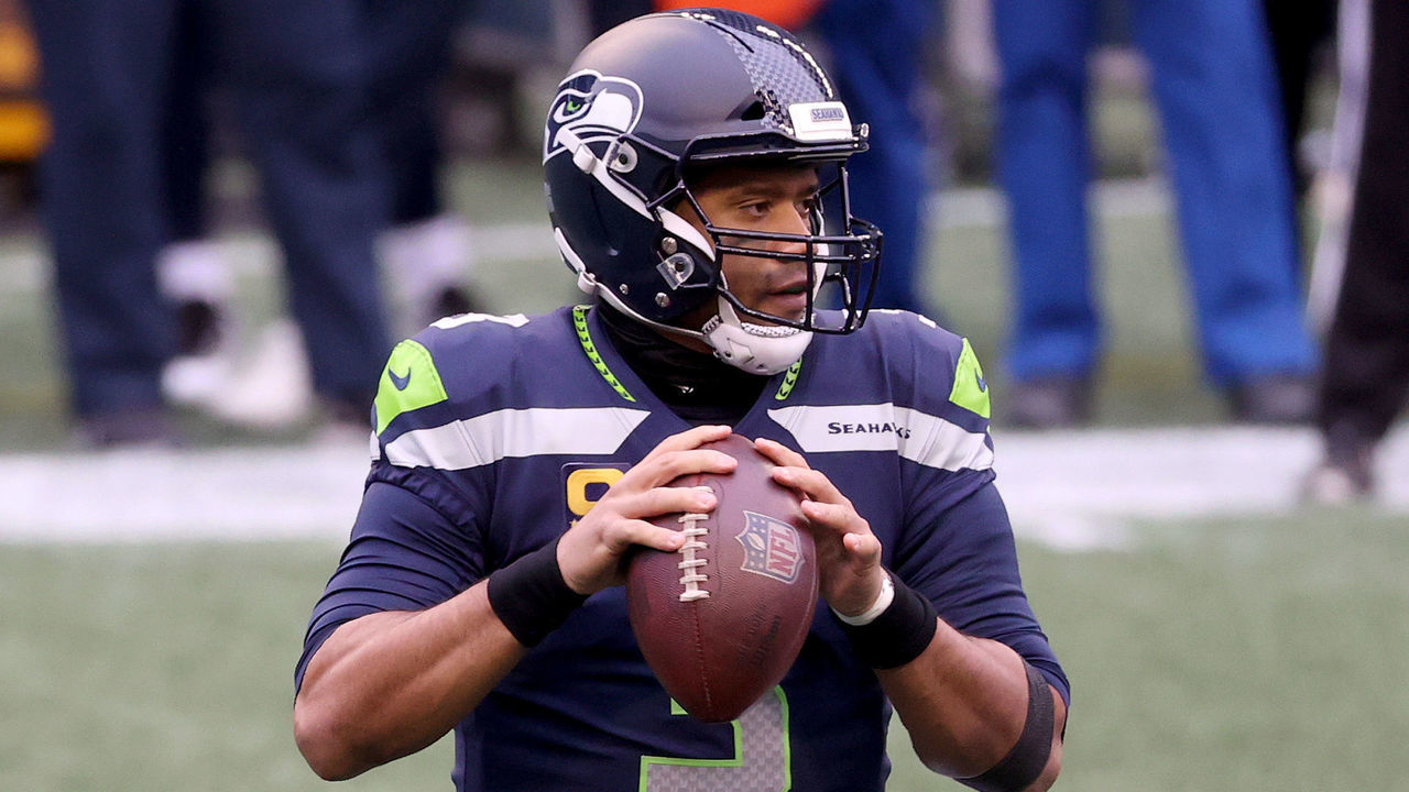 SEATTLE, WASHINGTON - DECEMBER 13: Russell Wilson #3 of the Seattle Seahawks looks to throw a pass against the New York Jets during the first quarter in the game at Lumen Field on December 13, 2020 in Seattle, Washington.