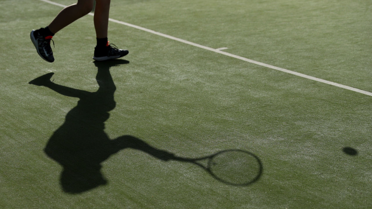 ALTRINCHAM, ENGLAND - SEPTEMBER 06: General View of the shadow of a competitor during the Fred Perry Championship regionals at Heyes Grove Tennis Club on September 06, 2020 in Altrincham, England.