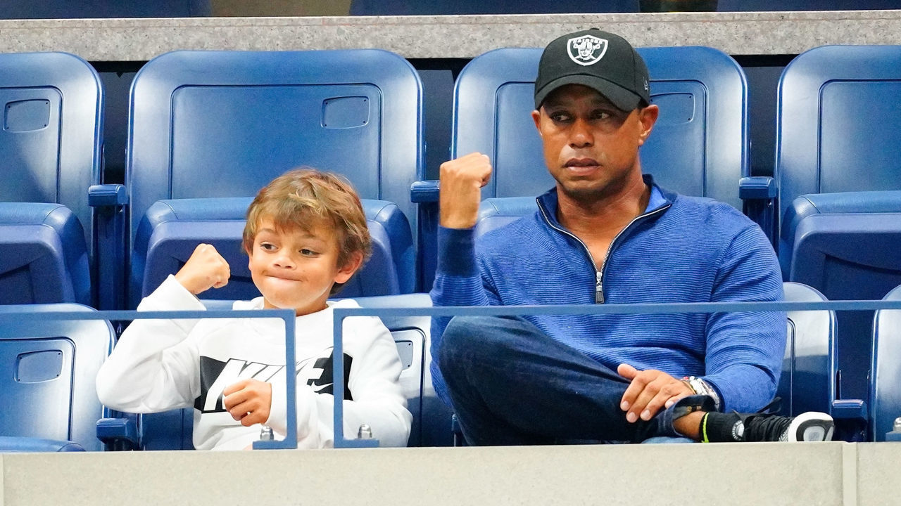 NEW YORK, NY - SEPTEMBER 02: Tiger Woods and his son Charlie Axel Woods cheer on Rafael Nadal at 2019 US Open in New York City.