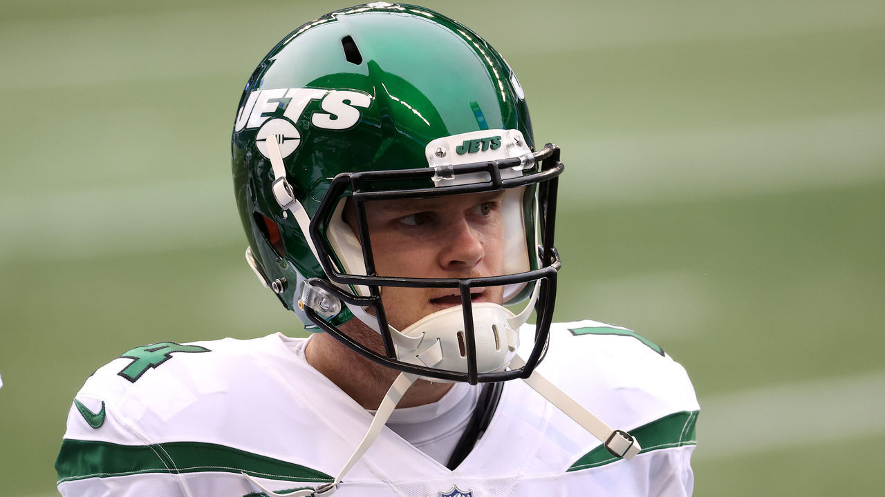 SEATTLE, WASHINGTON - DECEMBER 13: Sam Darnold #14 of the New York Jets reacts before their game against the Seattle Seahawks at CenturyLink Field on December 13, 2020 in Seattle, Washington.