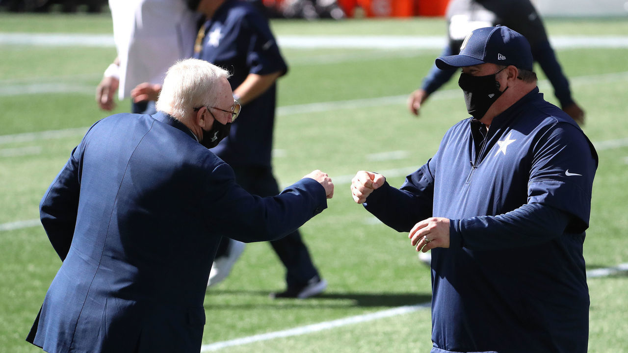 SEATTLE, WASHINGTON - SEPTEMBER 27: Dallas Cowboys Owner Jerry Jones (L) and head coach Mike McCarthy fist bump before their game against the Seattle Seahawks at CenturyLink Field on September 27, 2020 in Seattle, Washington.