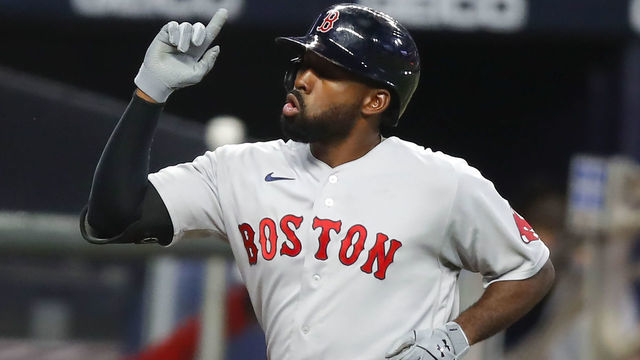 ATLANTA, GA - SEPTEMBER 25: Jackie Bradley Jr. #19 of the Boston Red Sox reacts after hitting a solo home run in the fifth inning of an MLB game against the Atlanta Braves at Truist Park on September 25, 2020 in Atlanta, Georgia.