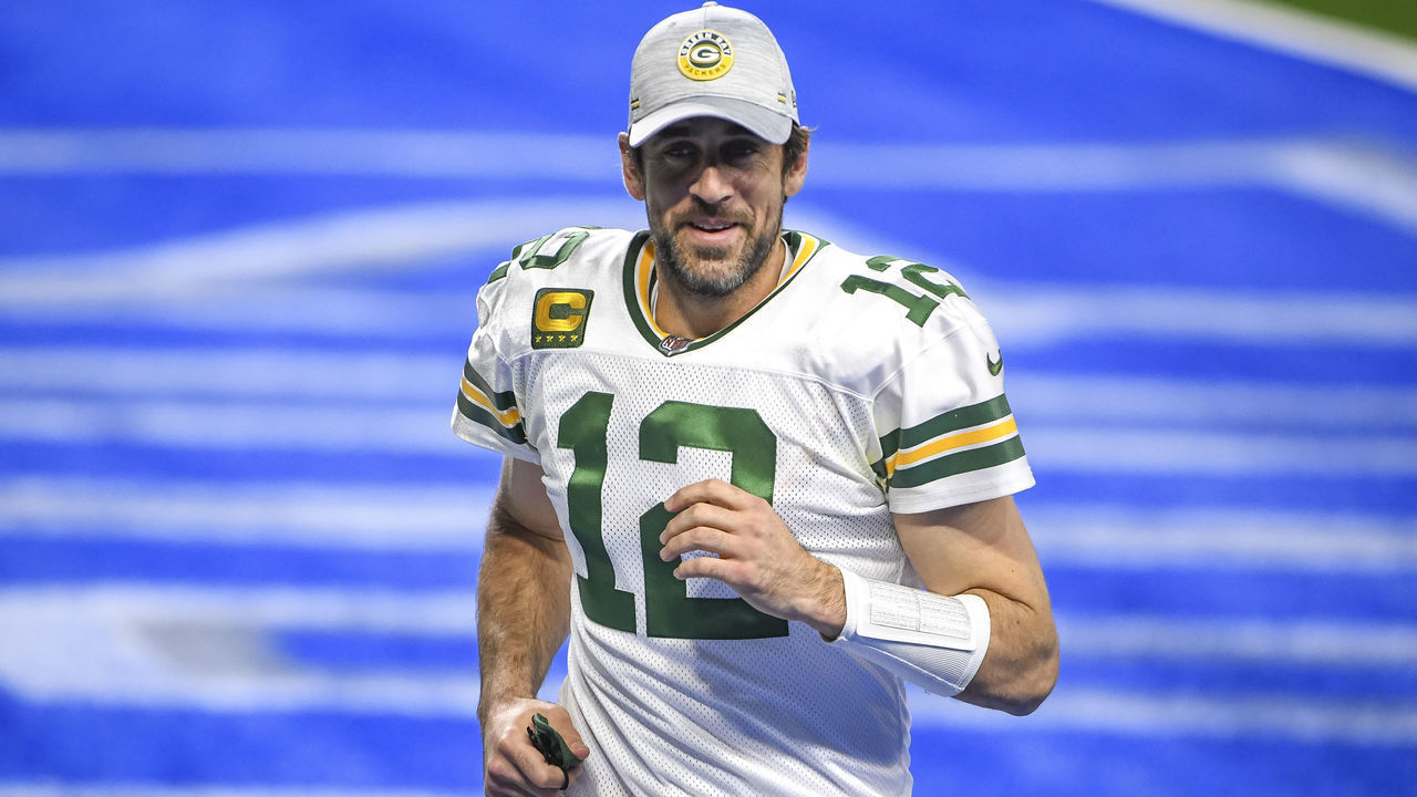 DETROIT, MICHIGAN - DECEMBER 13: Aaron Rodgers #12 of the Green Bay Packers looks on and smiles after the win against the Detroit Lions at Ford Field on December 13, 2020 in Detroit, Michigan.