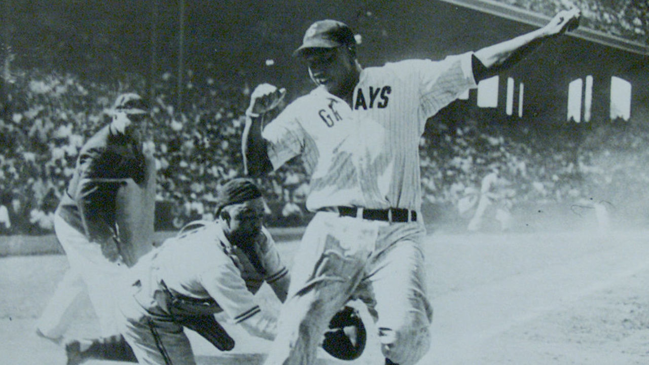 "Double Duty" Radcliffe, at 100 years old, is the oldest living player ffrom the Negro Leagues. He caught for Satchel Paige and played with Fidel Castro. His career spanned 36 years and more than 40 teams. Radcliffe tries to tag Josh Gibson of the Homestead Grays.