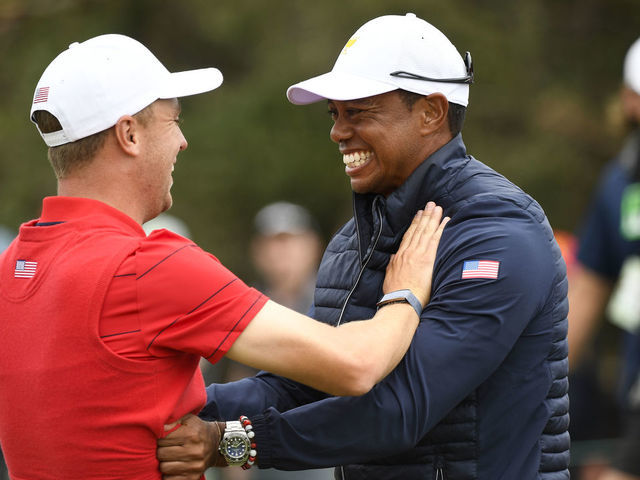 VICTORIA , AUSTRALIA - DECEMBER 15: U.S. Teams Justin Thomas and U.S. Team Captain Tiger Woods celebrate winning the Presidents Cup during the final round singles matches at the Presidents Cup at The Royal Melbourne Golf Club on December 15, 2019, in Victoria , Australia.