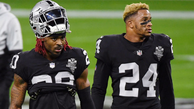 LAS VEGAS, NEVADA - NOVEMBER 22: Cornerback Damon Arnette #20 and strong safety Johnathan Abram #24 of the Las Vegas Raiders warm up before a game against the Kansas City Chiefs at Allegiant Stadium on November 22, 2020 in Las Vegas, Nevada. The Chiefs defeated the Raiders 35-31.