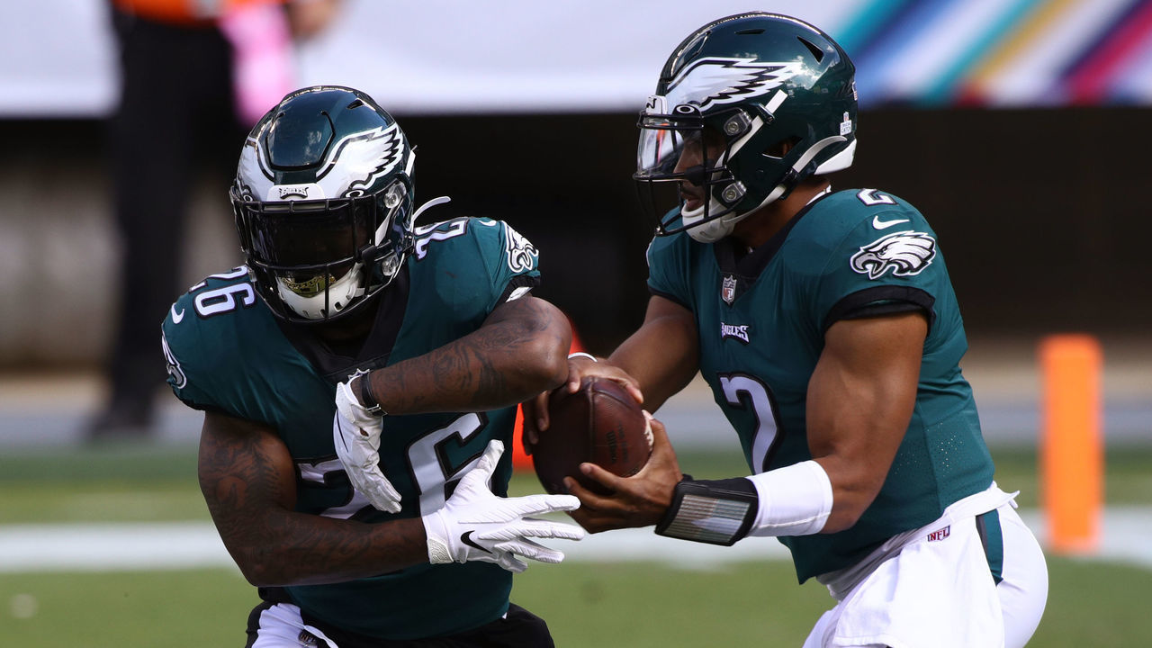 PHILADELPHIA, PA - OCTOBER 18: Philadelphia Eagles Quarterback Jalen Hurts (2) fakes a handoff to Running Back Miles Sanders (26) in the first half during the game between the Baltimore Ravens and Philadelphia Eagles on October 18, 2020 at Lincoln Financial Field in Philadelphia, PA.