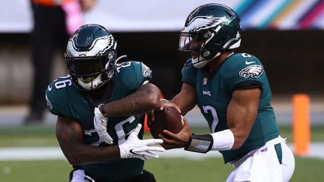 PHILADELPHIA, PA - OCTOBER 18: Philadelphia Eagles Quarterback Jalen Hurts (2) fakes a handoff to Running Back Miles Sanders (26) in the first half during the game between the Baltimore Ravens and Philadelphia Eagles on October 18, 2020 at Lincoln Financial Field in Philadelphia, PA.