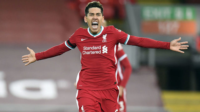 Liverpool's Roberto Firmino celebrates scoring his sides second goal during the Premier League match at Anfield, Liverpool.