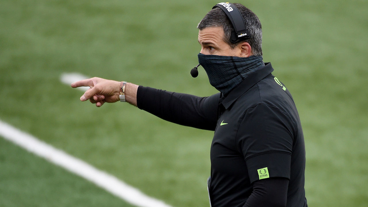 EUGENE, OREGON - NOVEMBER 21: Head coach Mario Cristobal of the Oregon Ducks cheers on his team during the second half of the game against the UCLA Bruins at Autzen Stadium on November 21, 2020 in Eugene, Oregon. Oregon won the game 38-35.