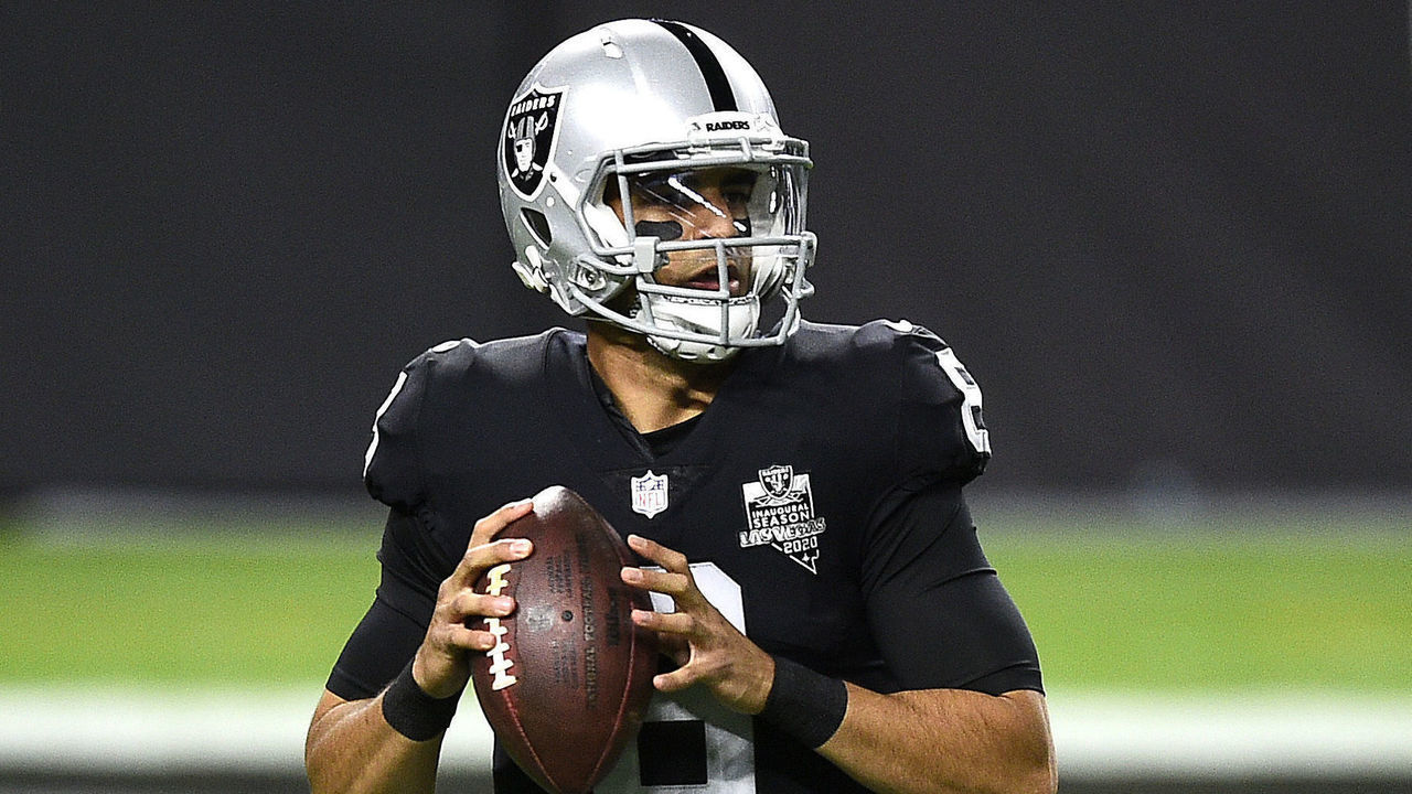 LAS VEGAS, NEVADA - DECEMBER 17: Marcus Mariota #8 of the Las Vegas Raiders looks to throw a pass during the first half against the Los Angeles Chargers at Allegiant Stadium on December 17, 2020 in Las Vegas, Nevada.