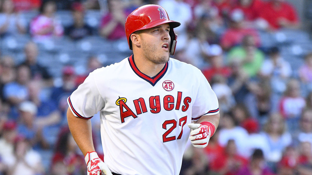 ANAHEIM, CA - AUGUST 17: Los Angeles Angels center fielder Mike Trout (27) walks to first base during a MLB game between the Chicago White Sox and the Los Angeles Angels of Anaheim on August 17, 2019 at Angel Stadium of Anaheim in Anaheim, CA.