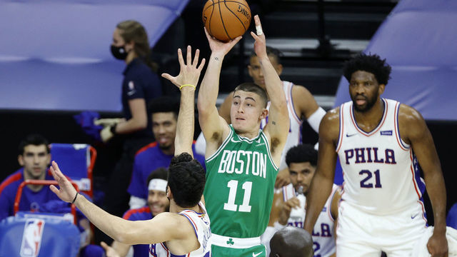 PHILADELPHIA, PENNSYLVANIA - DECEMBER 15: Payton Pritchard #11 of the Boston Celtics attempts a jump shot against the Philadelphia 76ers at Wells Fargo Center on December 15, 2020 in Philadelphia, Pennsylvania. NOTE TO USER: User expressly acknowledges and agrees that, by downloading and/or using this photograph, user is consenting to the terms and conditions of the Getty Images License Agreement.