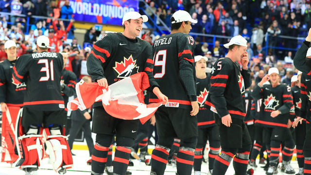 OSTRAVA, CZECH REPUBLIC - JANUARY 5, 2020: Canadian players Liam Foudy, Quinton Byfield, and Jacob Bernard-Docker (L-R front) celebrate with the trophy after the medal ceremony for the 2020 World Junior Ice Hockey Championship final match between Canada and Russia at Ostravar Arena; Canada won 4-3. Peter Kovalev/TASS
