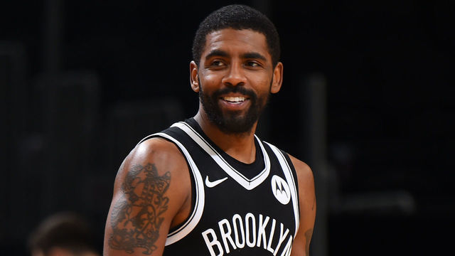 BOSTON, MA - DECEMBER 18: Kyrie Irving #11 of the Brooklyn Nets smiles during a preseason game against the Boston Celtics on December 18, 2020 at the TD Garden in Boston, Massachusetts. Mandatory Copyright Notice: Copyright 2020 NBAE