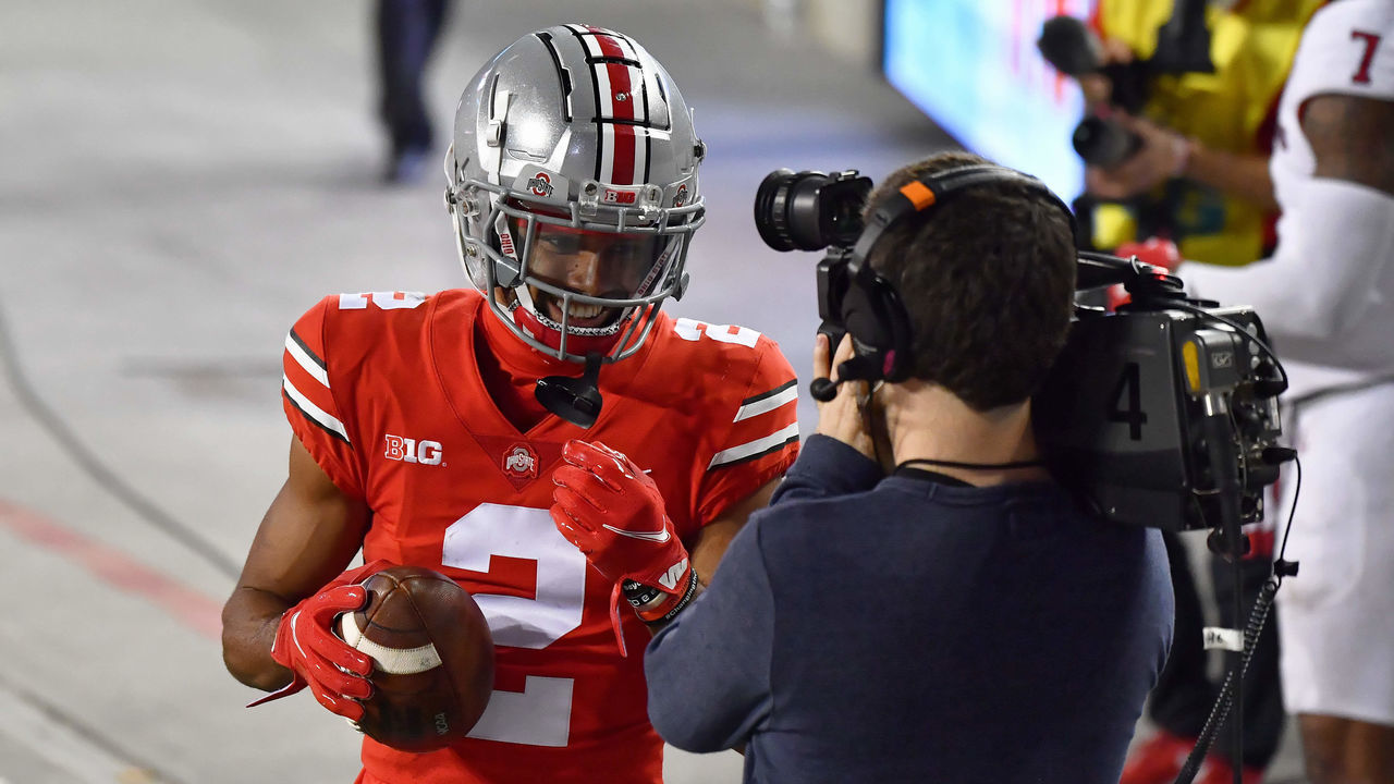 COLUMBUS, OH - NOVEMBER 7: Chris Olave #2 of the Ohio State Buckeyes smiles for the camera after catching a 33-yard touchdown pass in the fourth quarter against the Rutgers Scarlet Knights at Ohio Stadium on November 7, 2020 in Columbus, Ohio. Ohio State defeated Rutgers 49-27.