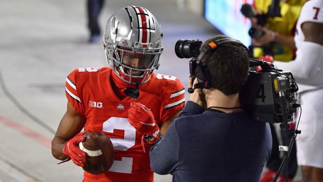 COLUMBUS, OH - NOVEMBER 7: Chris Olave #2 of the Ohio State Buckeyes smiles for the camera after catching a 33-yard touchdown pass in the fourth quarter against the Rutgers Scarlet Knights at Ohio Stadium on November 7, 2020 in Columbus, Ohio. Ohio State defeated Rutgers 49-27.