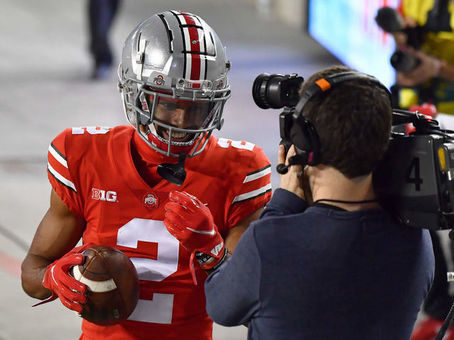 COLUMBUS, OH - NOVEMBER 7: Chris Olave #2 of the Ohio State Buckeyes smiles for the camera after catching a 33-yard touchdown pass in the fourth quarter against the Rutgers Scarlet Knights at Ohio Stadium on November 7, 2020 in Columbus, Ohio. Ohio State defeated Rutgers 49-27.