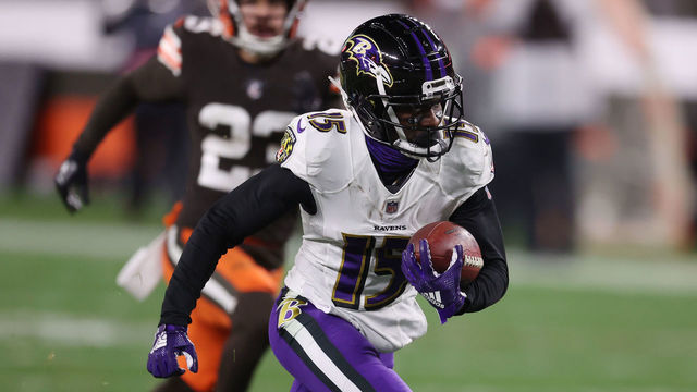 CLEVELAND, OHIO - DECEMBER 14: Marquise Brown #15 of the Baltimore Ravens runs after a catch against the Cleveland Browns at FirstEnergy Stadium on December 14, 2020 in Cleveland, Ohio.