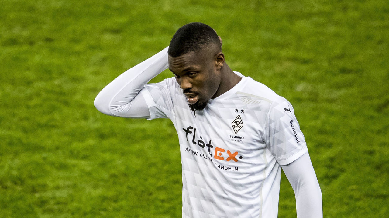MOENCHENGLADBACH, GERMANY - DECEMBER 19: Marcus Thuram of Borussia Moenchengladbach sees the red card during the Bundesliga match between Borussia Moenchengladbach and TSG Hoffenheim at Borussia-Park on December 19, 2020 in Moenchengladbach, Germany.