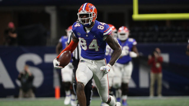 ATLANTA, GA - DECEMBER 19: Kyle Pitts #84 of the Florida Gators reacts after a gain against the Alabama Crimson Tide in the SEC Championship at Mercedes-Benz Stadium on December 19, 2020 in Atlanta, Georgia.