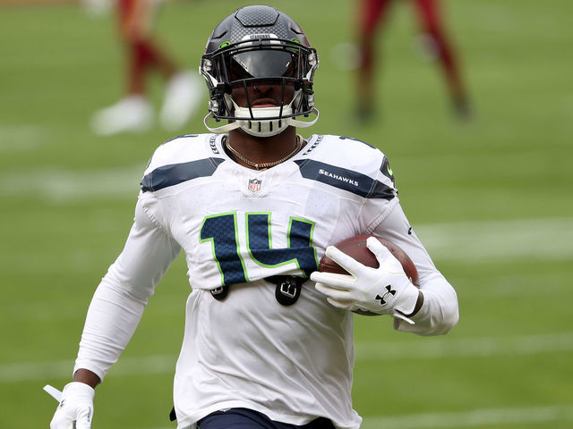 DK Metcalf of the Seattle Seahawks warms up before the game