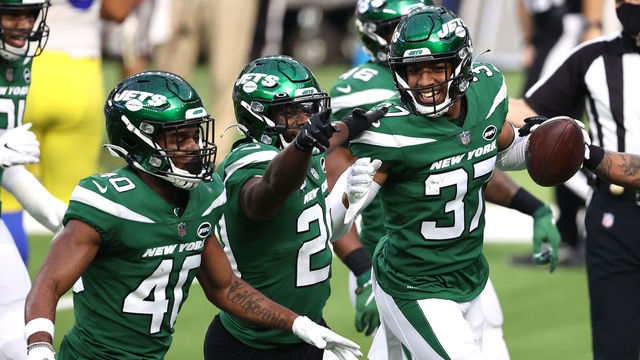 INGLEWOOD, CALIFORNIA - DECEMBER 20: Bryce Hall #37 of the New York Jets celebrates with teammates following an interception during the second quarter of a game against the Los Angeles Rams at SoFi Stadium on December 20, 2020 in Inglewood, California.