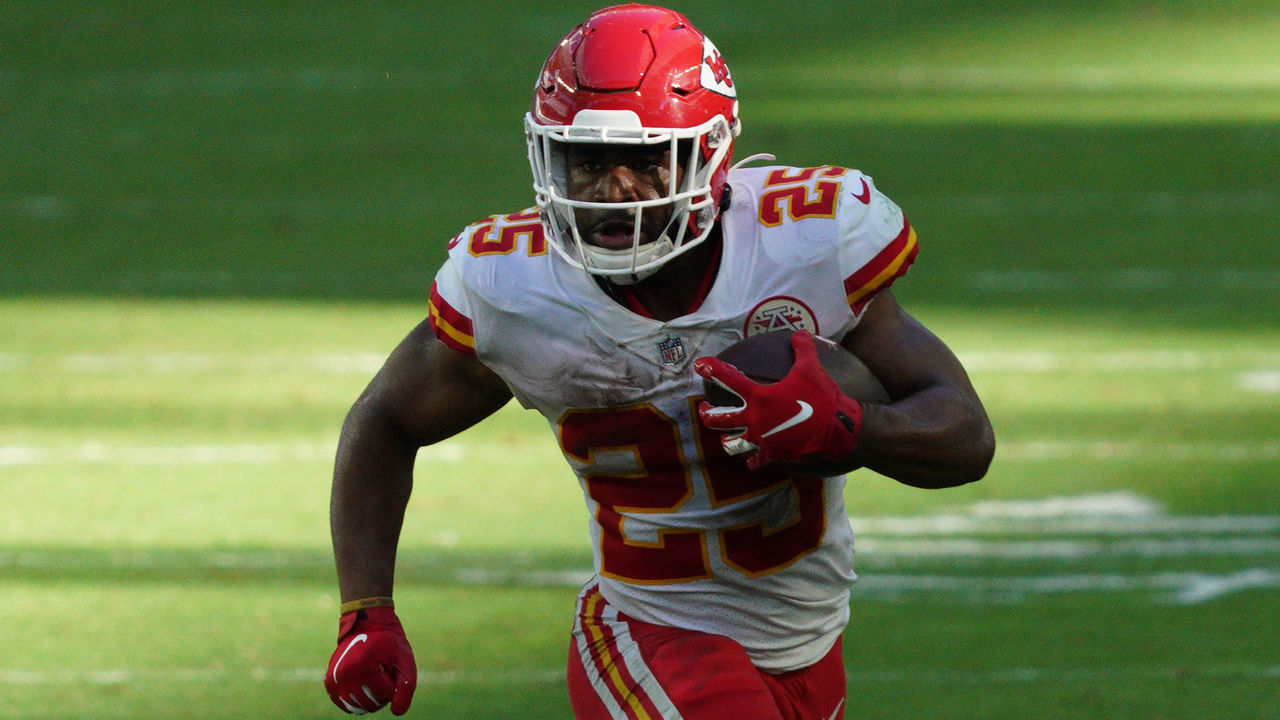 MIAMI GARDENS, FLORIDA - DECEMBER 13: Clyde Edwards-Helaire #25 of the Kansas City Chiefs runs with the ball against the Miami Dolphins at Hard Rock Stadium on December 13, 2020 in Miami Gardens, Florida.