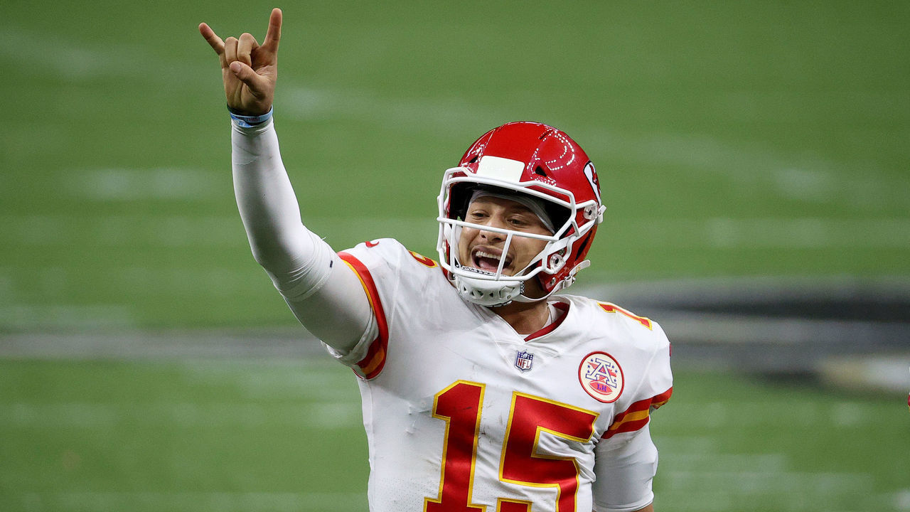NEW ORLEANS, LOUISIANA - DECEMBER 20: Patrick Mahomes #15 of the Kansas City Chiefs signals for a two-point conversion against the New Orleans Saints during the fourth quarter in the game at Mercedes-Benz Superdome on December 20, 2020 in New Orleans, Louisiana.