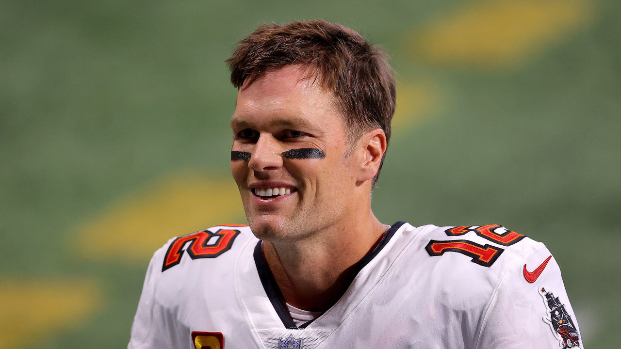 ATLANTA, GEORGIA - DECEMBER 20: Tom Brady #12 of the Tampa Bay Buccaneers smiles prior to the game against the Atlanta Falcons at Mercedes-Benz Stadium on December 20, 2020 in Atlanta, Georgia.