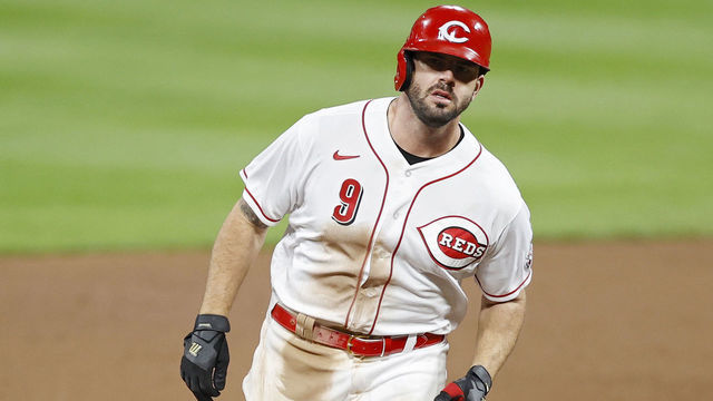 CINCINNATI, OH - SEPTEMBER 21: Mike Moustakas #9 of the Cincinnati Reds rounds the bases after hitting a three-run home run in the eighth inning of the game against the Milwaukee Brewers at Great American Ball Park on September 21, 2020 in Cincinnati, Ohio. The Reds won 6-3.