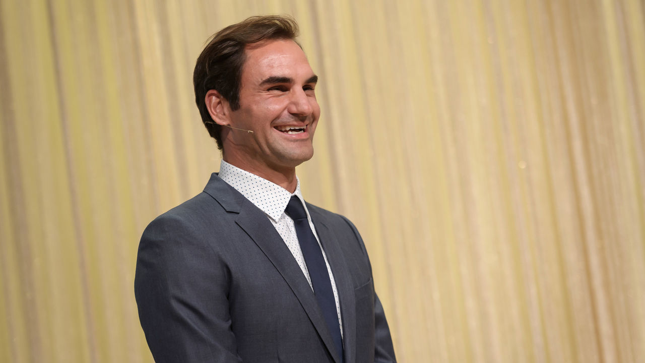 Swiss tennis champion Roger Federer laughs during the unveiling of a nine-meter high chocolate fountain at the new 'Lindt Home of chocolate' of the Swiss chocolatier and confectionery company on September 10, 2020 in Kilchberg near Zurich.