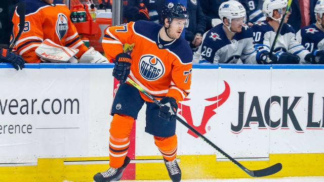 EDMONTON, AB - MARCH 11: Oscar Klefbom #77 of the Edmonton Oilers plays the puck along the boards during first period action against the Winnipeg Jets at Rogers Place on March 11, 2020 in Edmonton, Alberta, Canada. The Jets defeated the Oilers 4-2.
