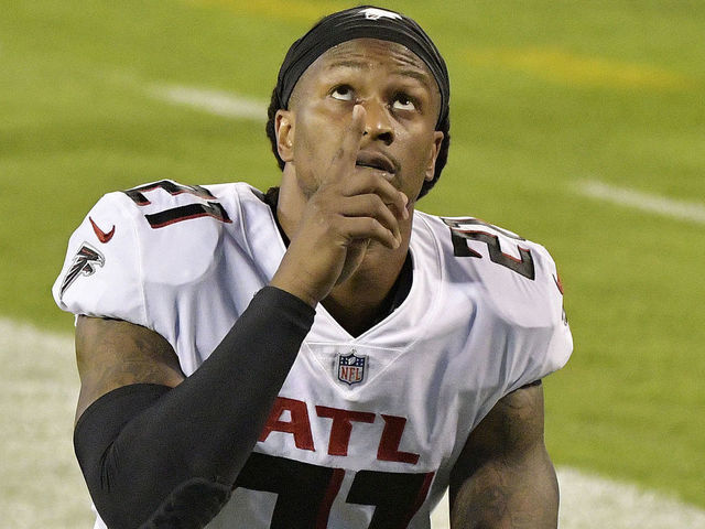 CHARLOTTE, NORTH CAROLINA - OCTOBER 29: Todd Gurley #21 of the Atlanta Falcons points to the sky before a game against the Carolina Panthers at Bank of America Stadium on October 29, 2020 in Charlotte, North Carolina.