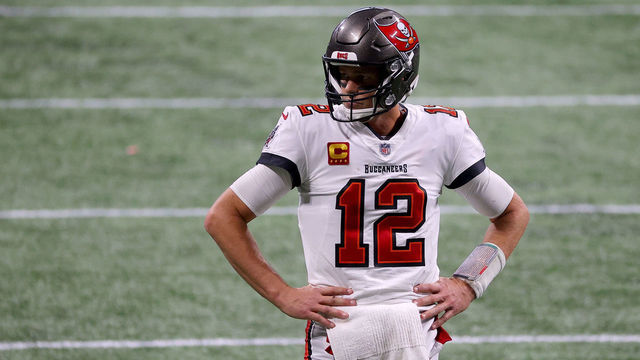 ATLANTA, GEORGIA - DECEMBER 20: Tom Brady #12 of the Tampa Bay Buccaneers reacts after a first down against the Atlanta Falcons during the fourth quarter in the game at Mercedes-Benz Stadium on December 20, 2020 in Atlanta, Georgia.