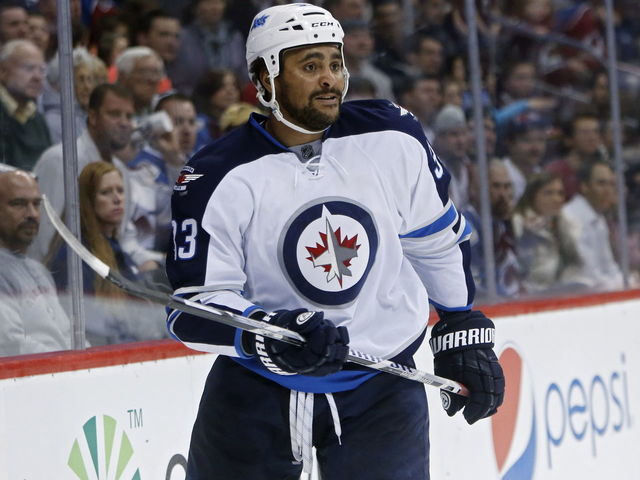 Jets' Byfuglien hopes to start next season on defense, Maurice has other ideas