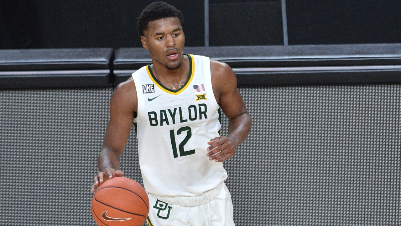 LAS VEGAS, NEVADA - NOVEMBER 28: Jared Butler #12 of the Baylor Bears looks on with the ball against the Louisiana Ragin' Cajuns in the first half of their game during the #VegasBubble basketball tournament at T-Mobile Arena on November 28, 2020 in Las Vegas, Nevada. Baylor won 112-82.