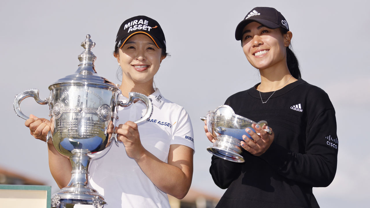 NAPLES, FLORIDA - DECEMBER 20: Sei-Young Kim of Korea poses with the Rolex Player of the Year trophy and Danielle Kang of the United States poses with the Vare Trophy after the final round of the CME Group Tour Championship at Tiburon Golf Club on December 20, 2020 in Naples, Florida.
